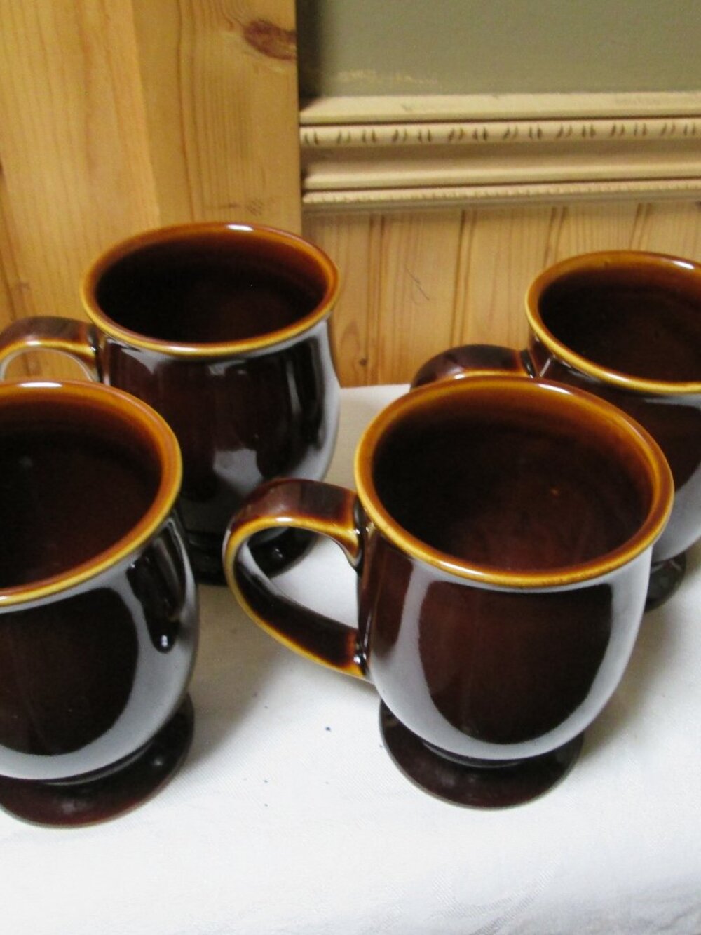 4 vtg Earthenware coffee mugs drip brown glaze pedestal